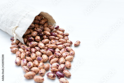 Raw bean grains (Phaseolus vulgaris) displayed in bowl