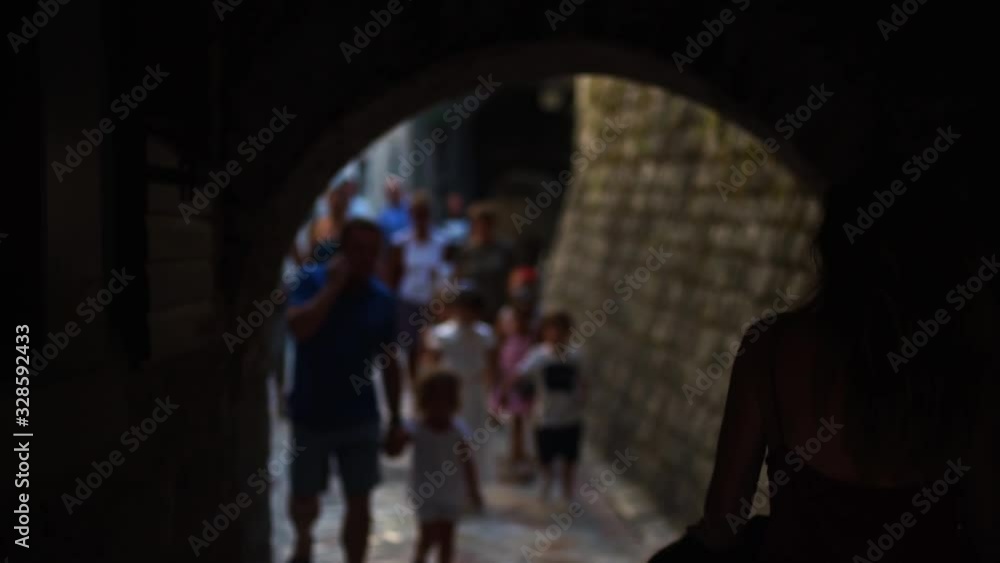 Young mother with a stroller while traveling in old European cities. Young mother with a stroller while traveling in old European cities.