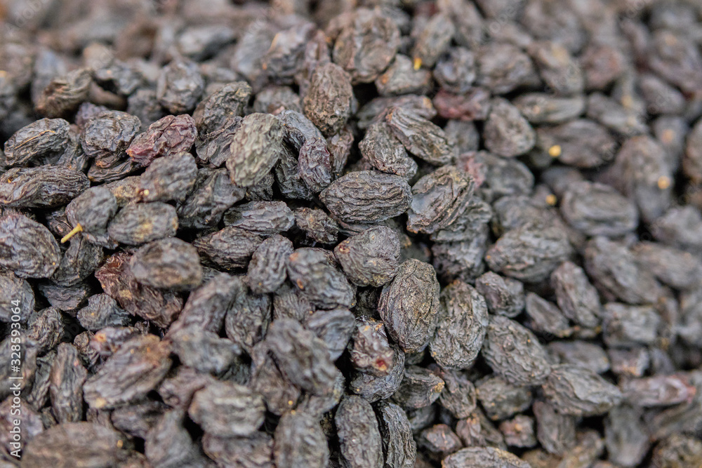Background and texture of black raisins. Background and texture of black raisins.