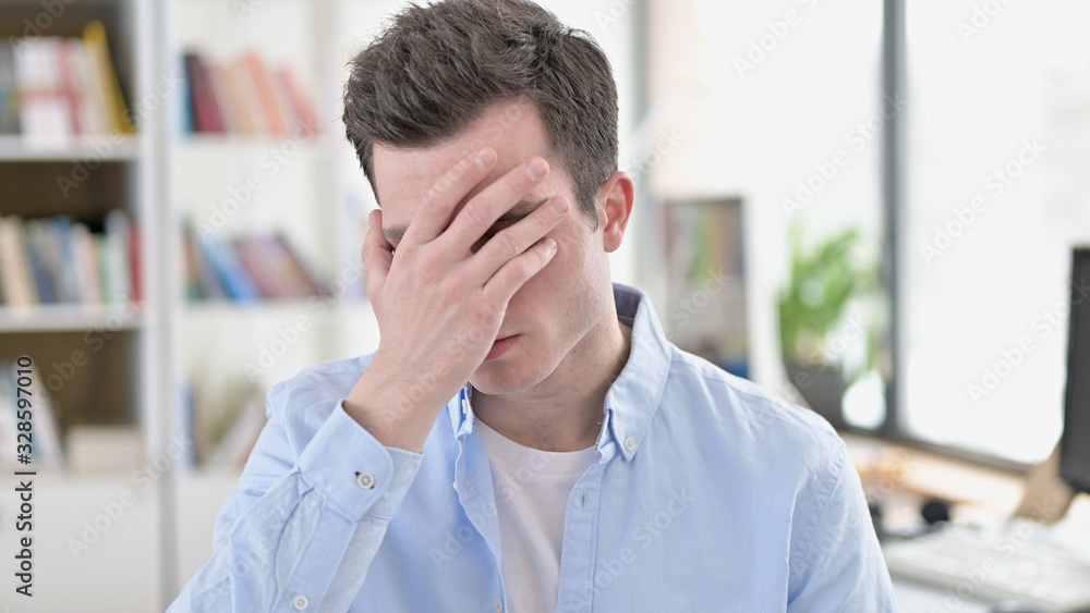 Headache, Tired Young Man having Pain in Head Headache, Tired Young Man having Pain in Head