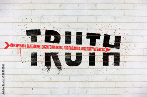 Obraz na płótnie The word truth with an arrow of conspiracy, fake news, disinformation, propagand