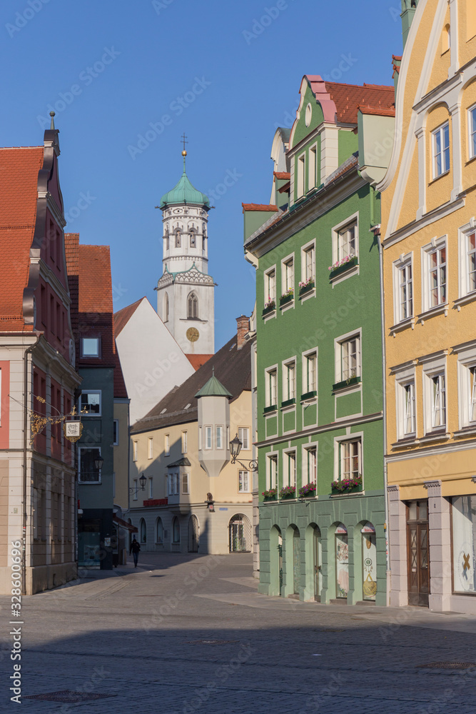 colored buildings on a Memmingen square, blue and clear sky