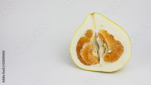 Pamela fruit on a white background. Place for text photo