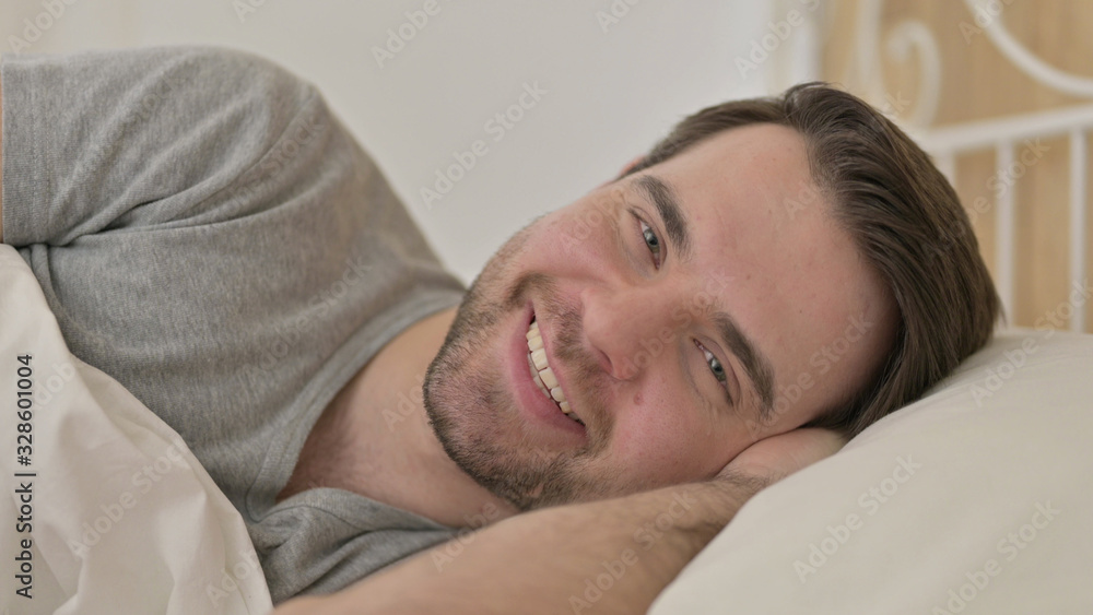 Portrait of Young Man Smiling at Camera Portrait of Young Man Smiling at Camera
