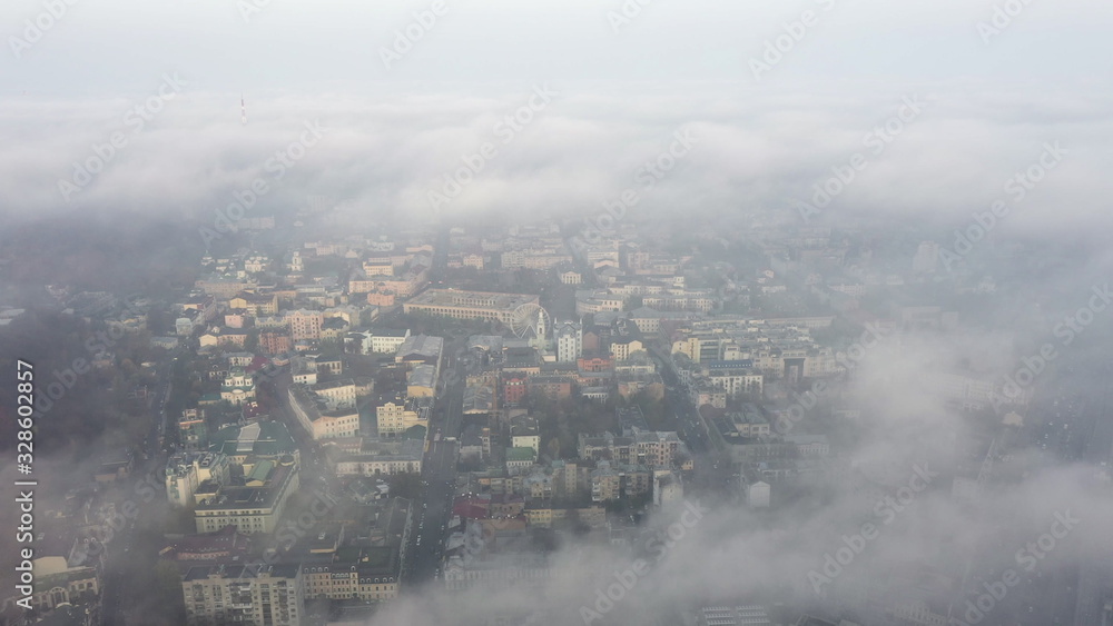 Aerial view of the city in the fog