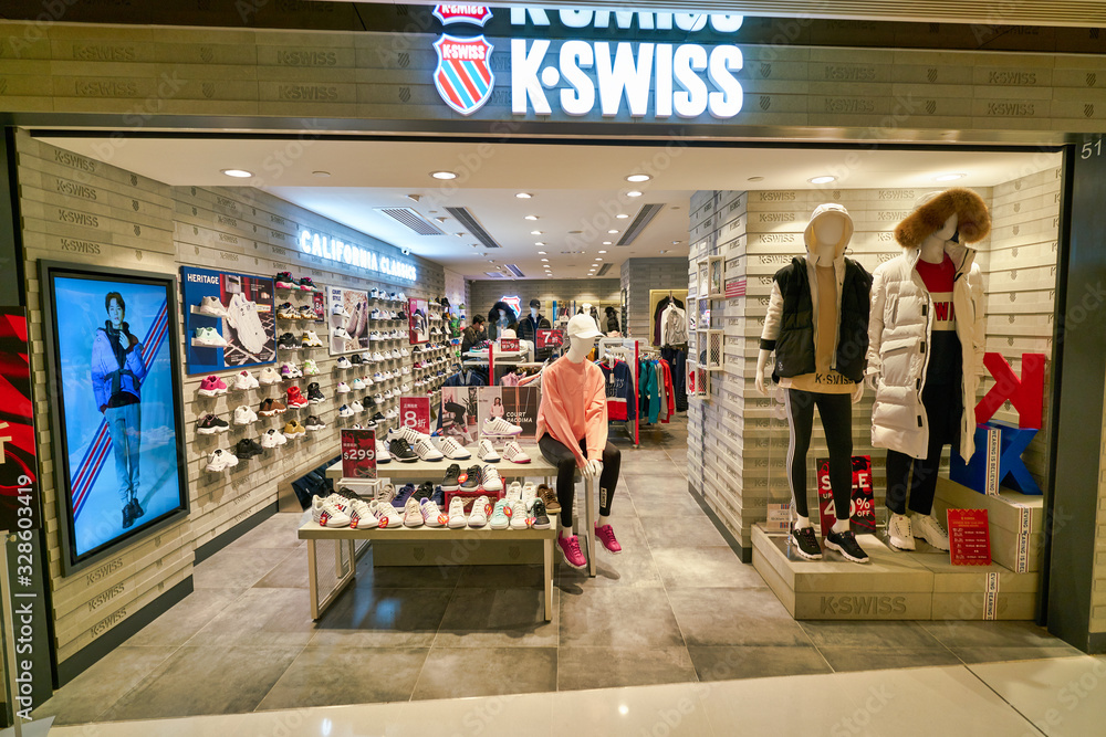 HONG KONG, CHINA - CIRCA JANUARY, 2019: K-Swiss brandname over a store at  New Town Plaza in Hong Kong. K-Swiss, Inc. is an American athletic shoe  brand. Stock Photo | Adobe Stock