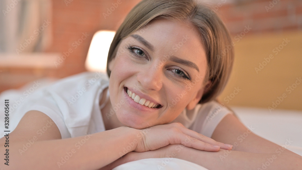 Close up of Beautiful Creative Young Woman Smiling at the Camera Close up of Beautiful Creative Young Woman Smiling at the Camera