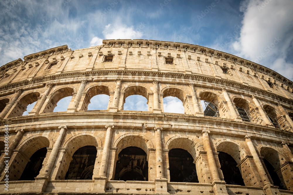 Naklejka premium the famous Coliseum of Rome (Colosseum - aka Flavian Amphitheatre), Lazio, Italy