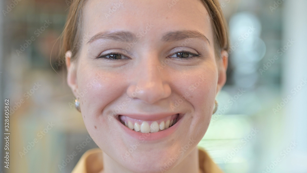 Close up of Smiling Face of Young Woman Close up of Smiling Face of Young Woman