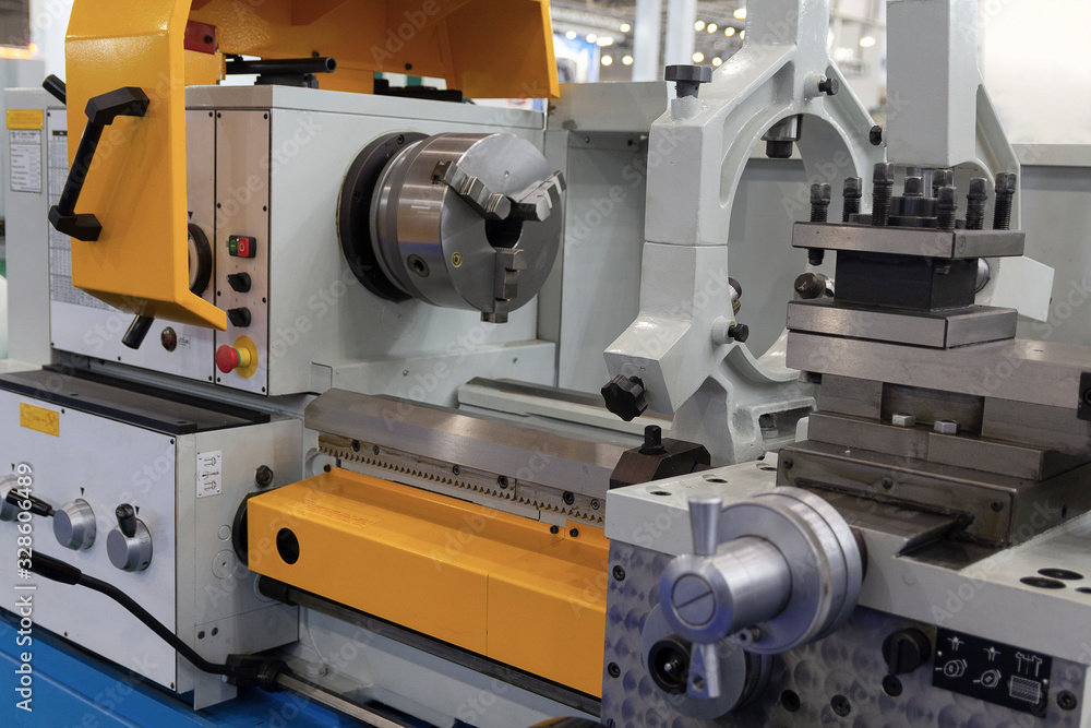 Modern CNC machine tool near. Industry, metal processing