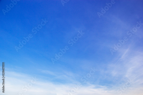 Blue sky background and white clouds soft focus  and copy space