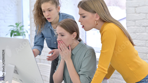 Start Up Team in Shock Reacting to Failure on Desktop