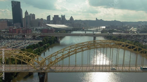 Aerial: Allegheny River, traffic on Sixteenth Street Bridge and downtown Pittsburgh, Pennsylvania, USA. 16 September 2019