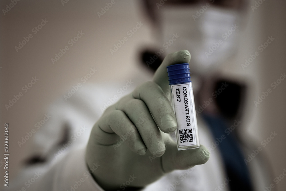 Corona Virus in Lab. New Epidemic Coronavirus 2019 nCoV, fear of a coronavirus pandemic, doctor with a breathing medical respiratory mask and a test tube with self-generated CR code: Corana Test 