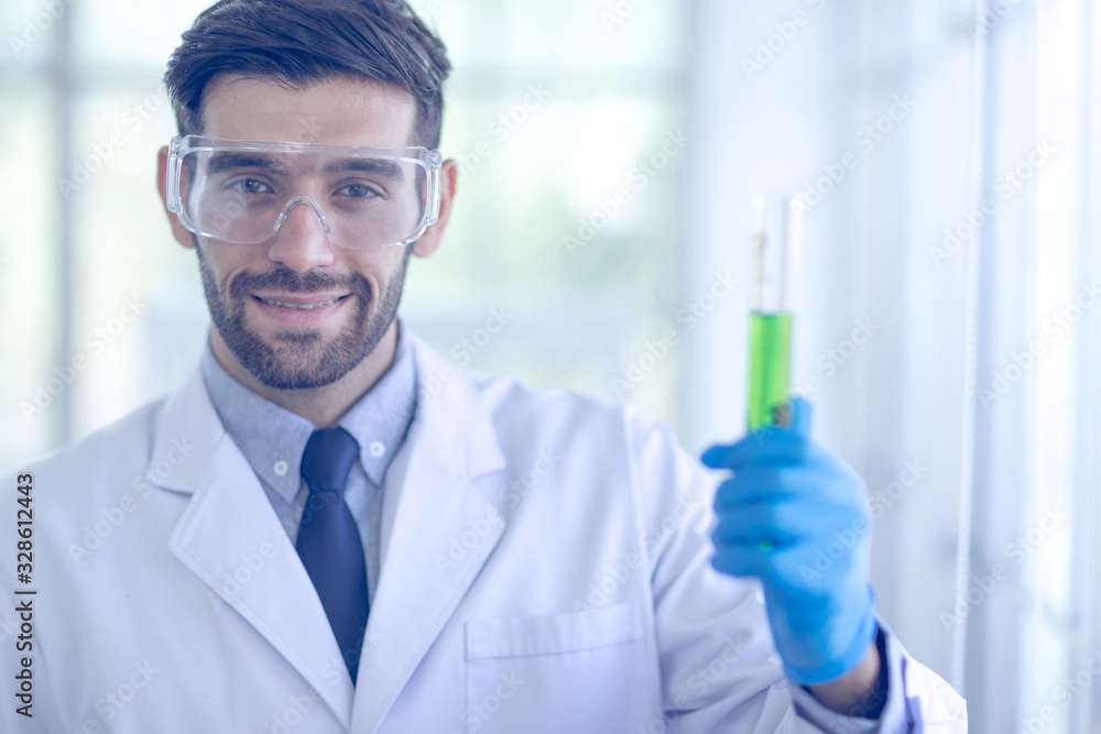 The Scientists are experimenting with chemicals in the laboratory. Concept, The scientists wear white protective clothing is experimenting with drug anti- Coronavirus, Covid2019 The Scientists are experimenting with chemicals in the laboratory. Concept, The scientists wear white protective clothing is experimenting with drug anti- Coronavirus, Covid2019