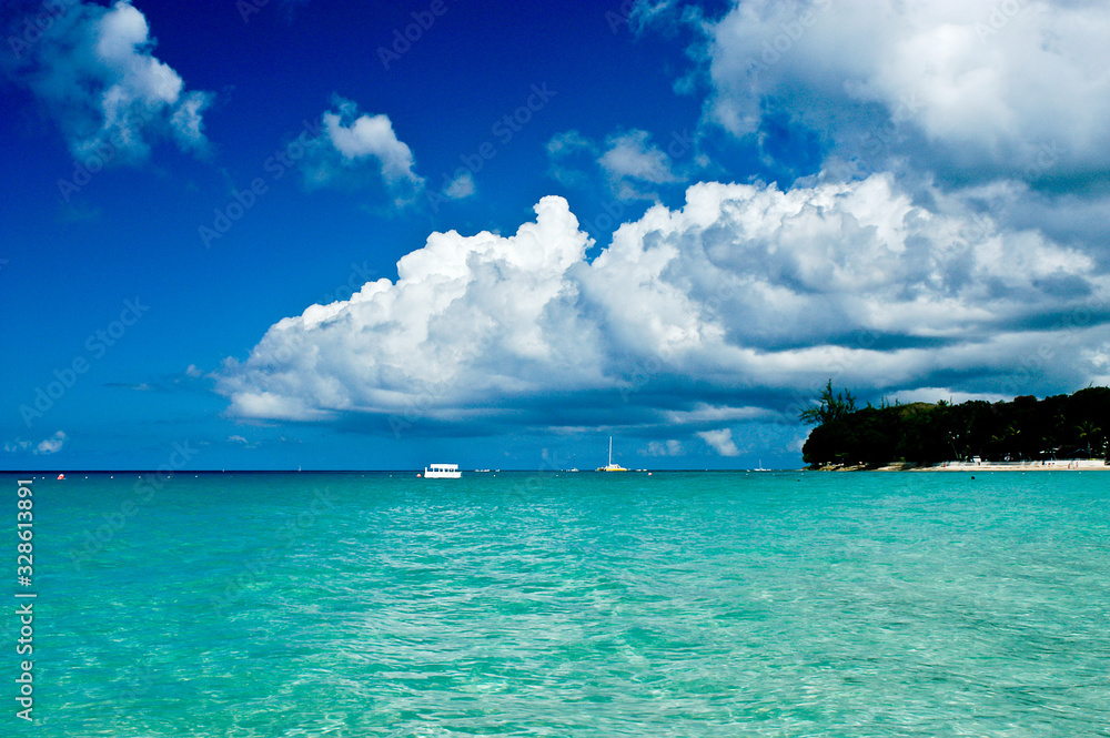 Summer clouds over a beach in Barbados