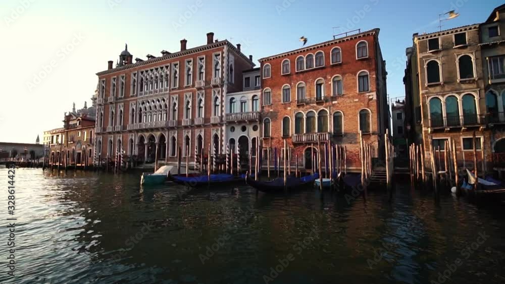 Drone shot low angle. Grand canal in Venice. Famous landmark in Venice, Italy. Romantic honeymoon travel & cruise ship destination in Europe. Drone shot low angle. Grand canal in Venice. Famous landmark in Venice, Italy. Romantic honeymoon travel & cruise ship destination in Europe.