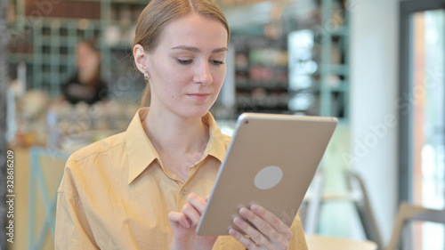 Portrait of Young Woman using Digital Tablet Free Download Portrait of Young Woman using Digital Tablet - GFXLoad