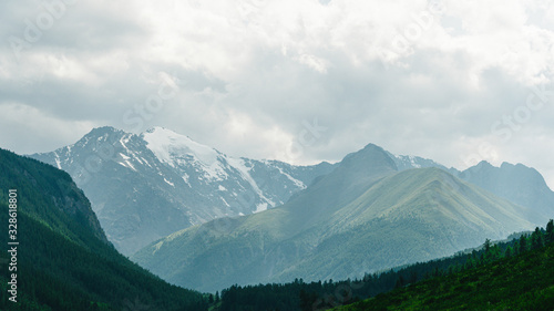 high cliffs in blue haze  silhouette of mountain range in fog  meditation and relaxation in nature