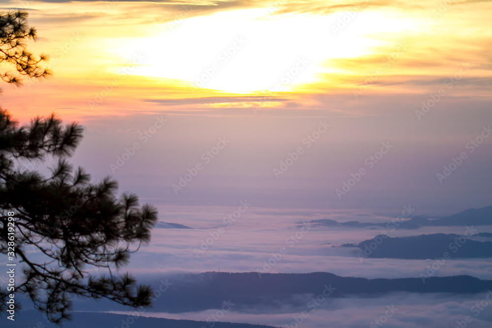 Fototapeta premium sunrise over sea of mist on mountain
