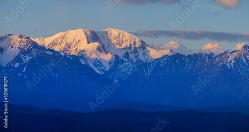 Mountain peaks at sunrise, bright view, panorama landscape