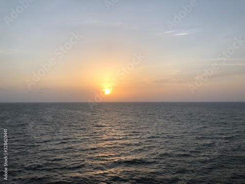 sunset over the sea © Amir