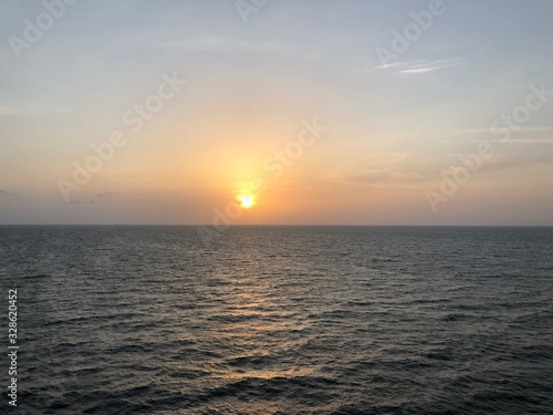 sunset over the sea © Amir