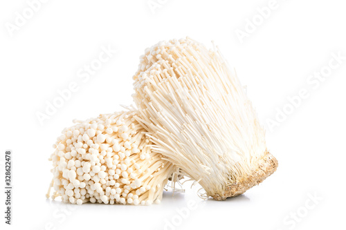 White fresh golden needle mushroom or enoki mushroom isolated on white