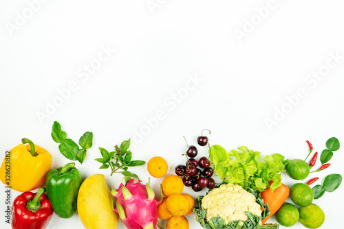 Fresh fruit and vegetable. Flat lay of fresh raw organic vegetables on white background