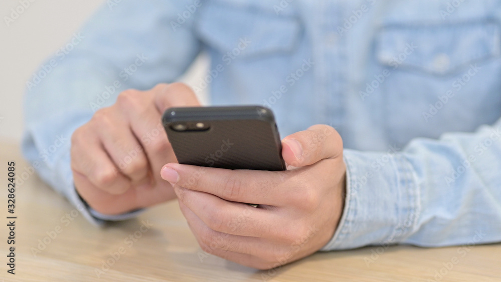 Text Messaging onSmartphone by Man Text Messaging onSmartphone by Man