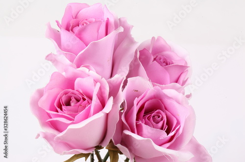 Pink colorful textile rose closeup