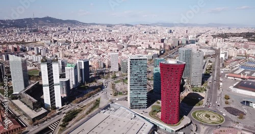BARCELONA, SPAIN - MARCH 19, 2019: Panoramic aerial view of business district of Gran Via and Placa d Europa with modern skyscrapers photo