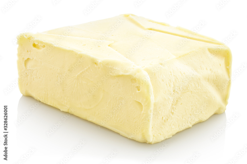 Fresh Block of Butter. Isolated on white background with shadow reflection. With clipping path. With vector path. On piece of whole butter block on white bg. On reflective underlay. With vector path. Fresh Block of Butter. Isolated on white background with shadow reflection. With clipping path. With vector path. On piece of whole butter block on white bg. On reflective underlay. With vector path.