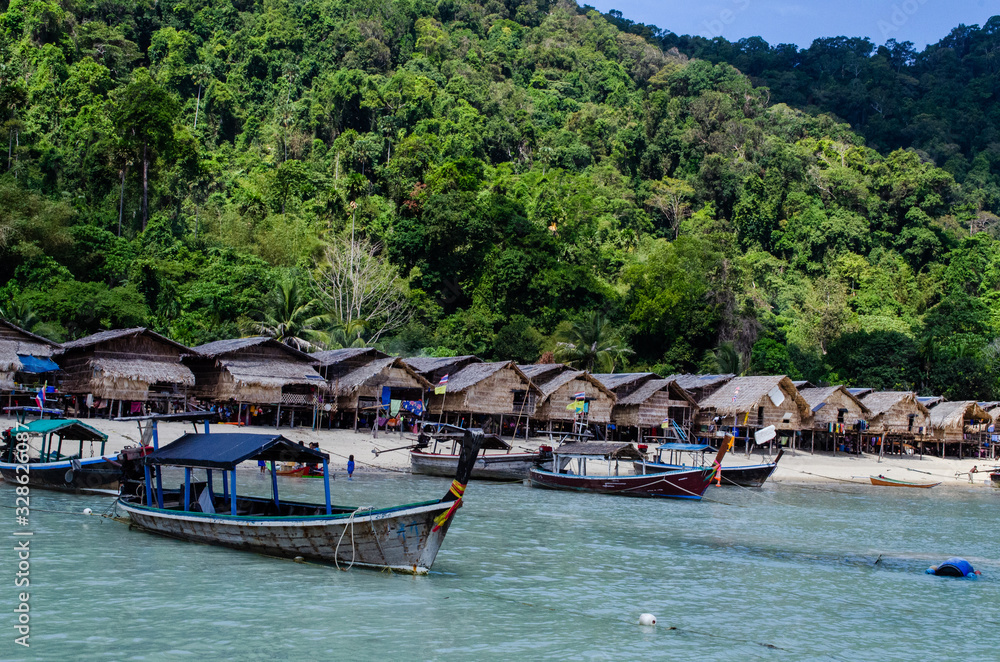 The Moken Sea Gypsy Village at Koh Surin on the Mu Ko Surin National Park, Surin Islands of Thailand. The Moken Sea Gypsy Village at Koh Surin on the Mu Ko Surin National Park, Surin Islands of Thailand.