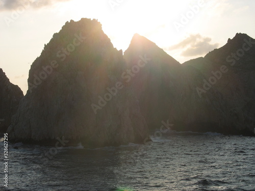 sunset on coast of sea