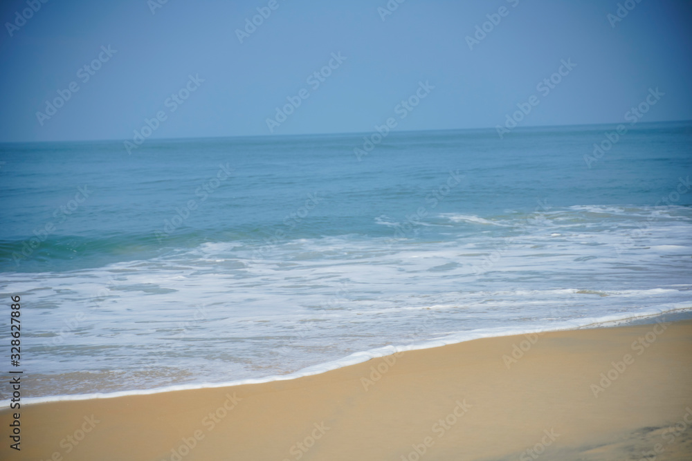 Sea waves coming to a beach