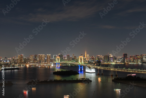 view of the river in Odaiba Tokyo. Rainbow Bridge at Night.