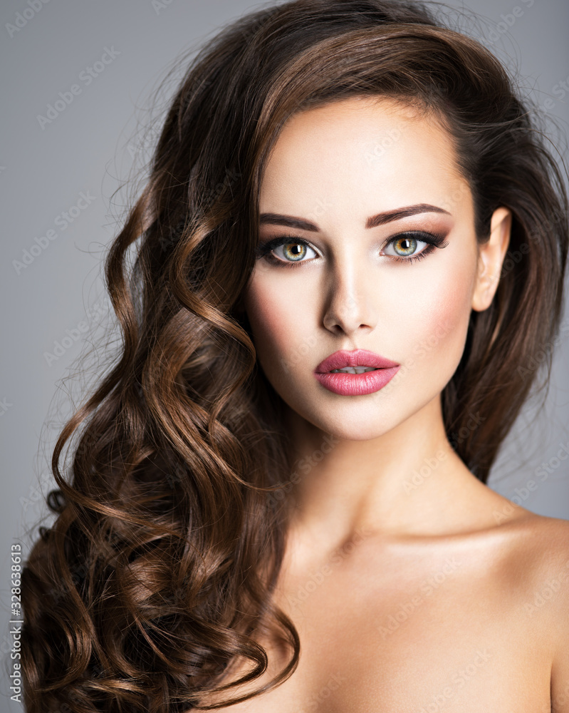 Fototapeta premium Beautiful woman with long bown hair