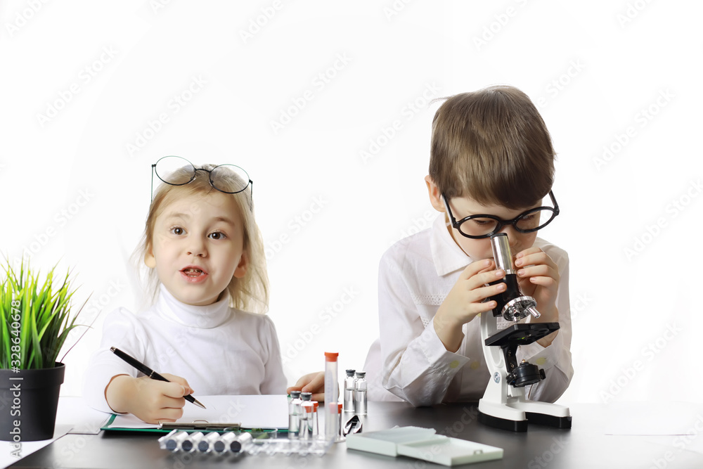 Young scientists chemists. Doctor, laboratory assistant. Young scientists chemists. Doctor, laboratory assistant.