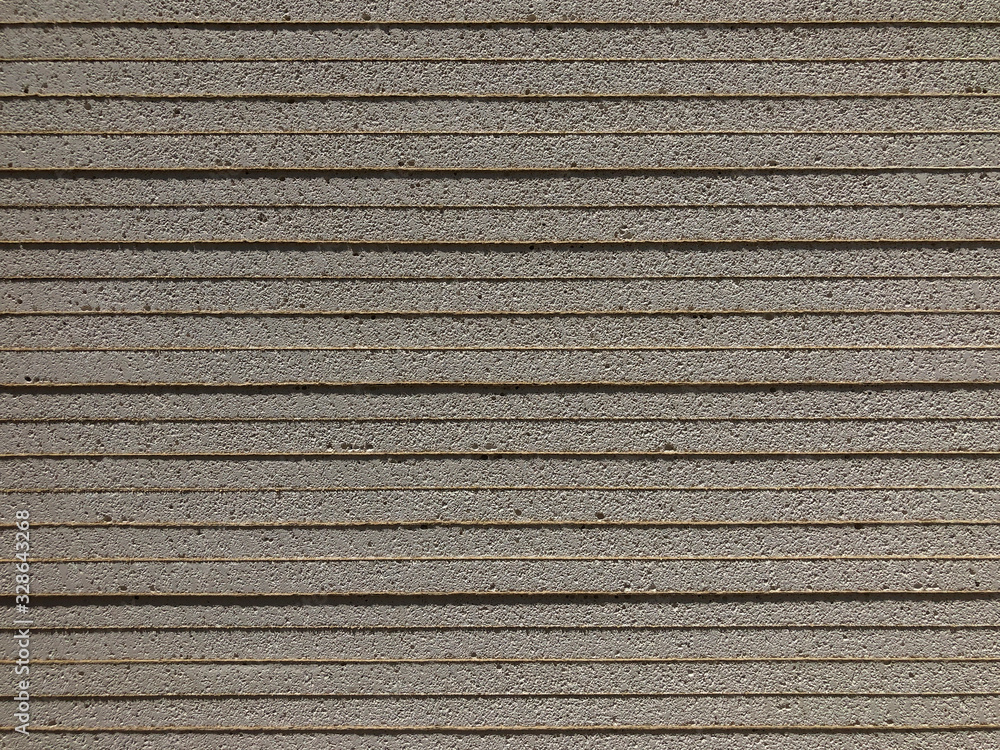 Piled sheets of drywall. Plasterboard sheets. Gypsum cardboard Piled sheets of drywall. Plasterboard sheets. Gypsum cardboard
