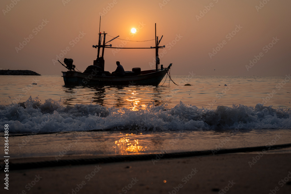 Fisherman preparing the boat on early morning for go to Catch fish in Thailand on sunshine day
