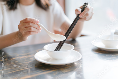  pouring hot water on the chopsticks