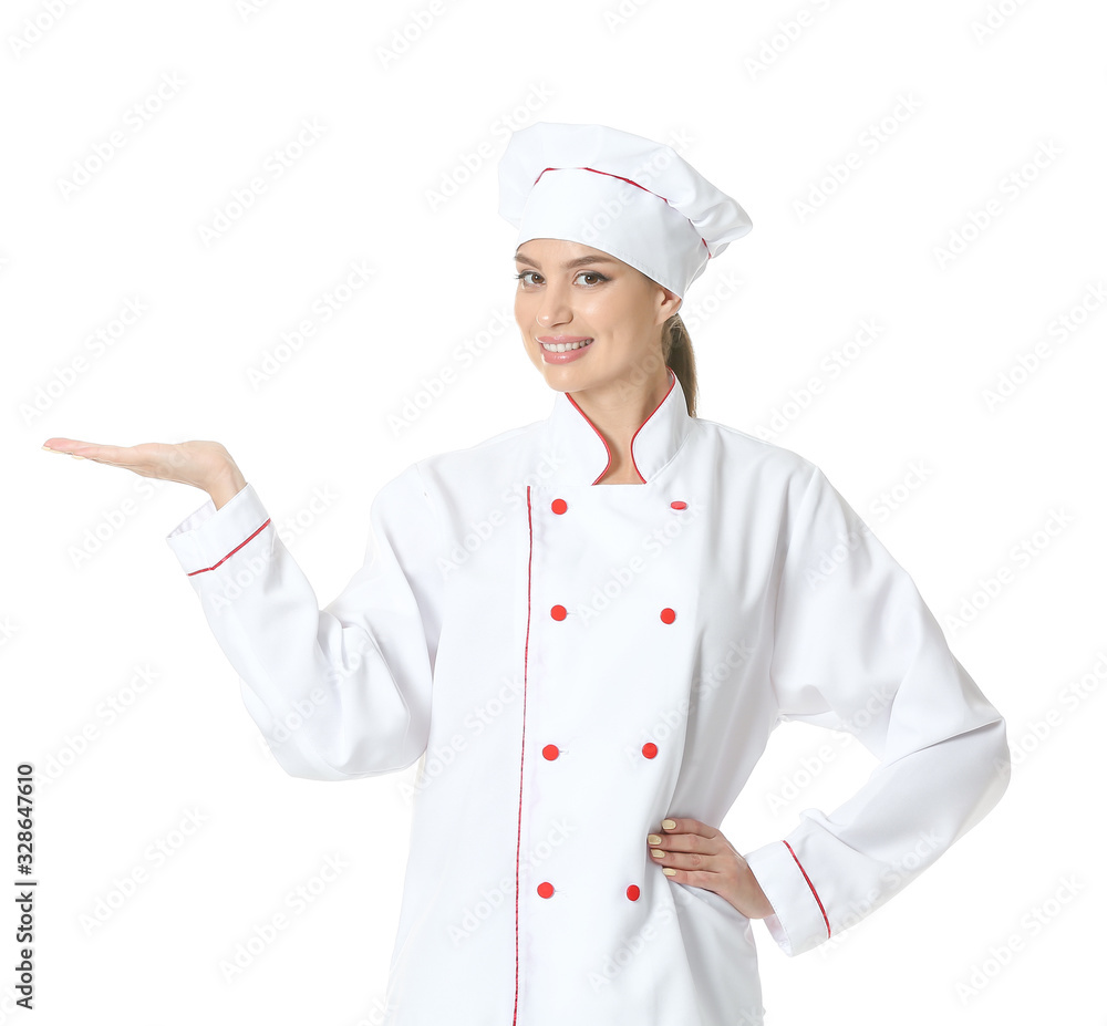 Beautiful female chef showing something on white background Beautiful female chef showing something on white background