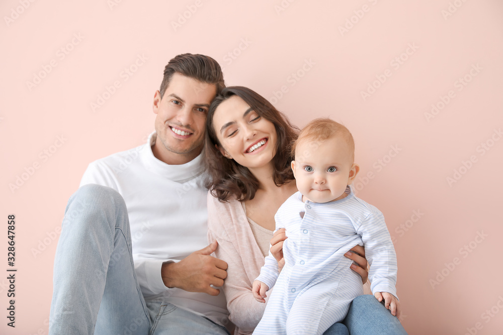 Cute baby with parents on color background Cute baby with parents on color background