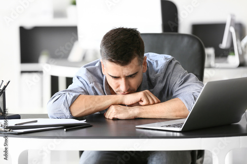 Overworked Young Man Experi...