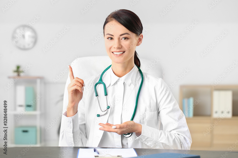 Female cardiologist in modern clinic Female cardiologist in modern clinic