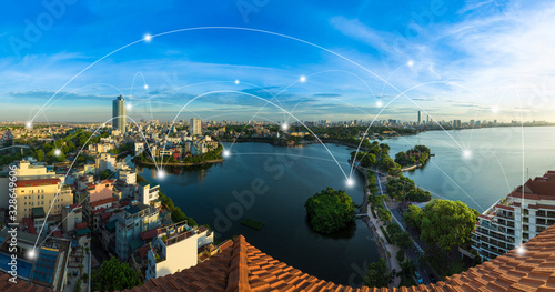 Smart city and wireless communication network concept. Digital network connection lines of Hanoi city at West Lake or Ho Tay