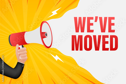 Hand Holding Megaphone with we've moved. Megaphone banner. Web design. Vector stock illustration.
