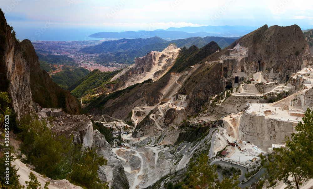 Aerial view of marble quarry Canalgrande Alto with Ligurian sea coastline. Carrara. Apuan Alps. Tuscany. Italy.