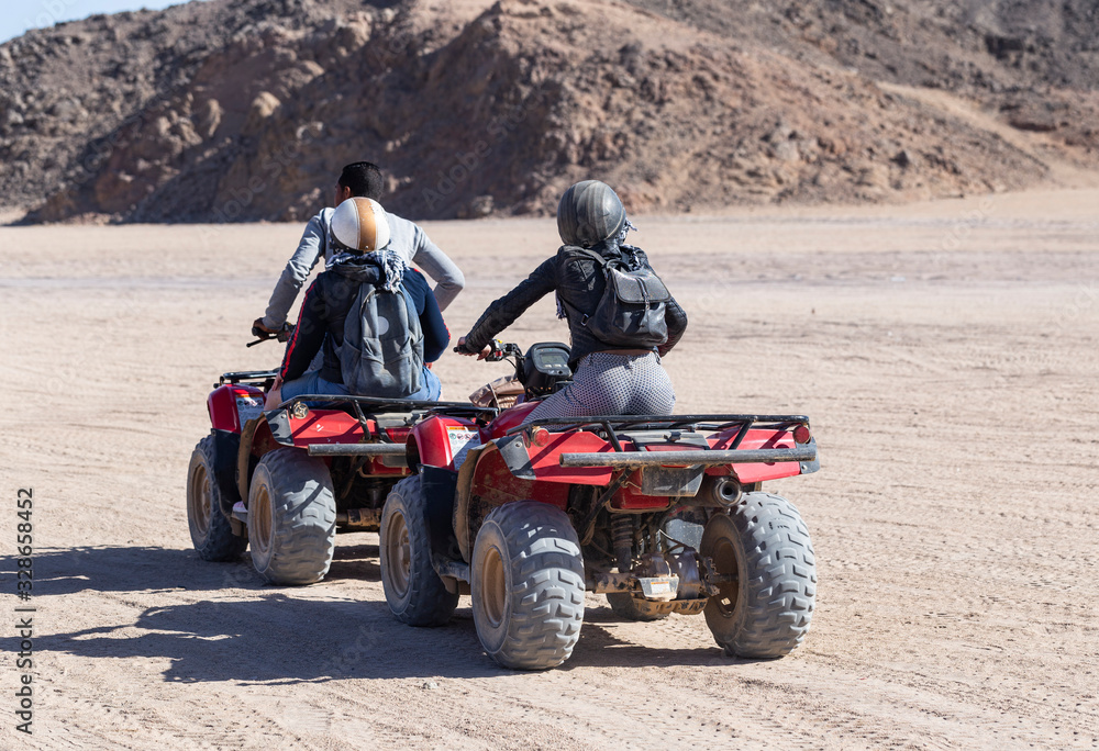 Tours of the desert on Quad bikes. ATV safaris. A vehicle for racing in the Sahara. Tours of the desert on Quad bikes. ATV safaris. A vehicle for racing in the Sahara.